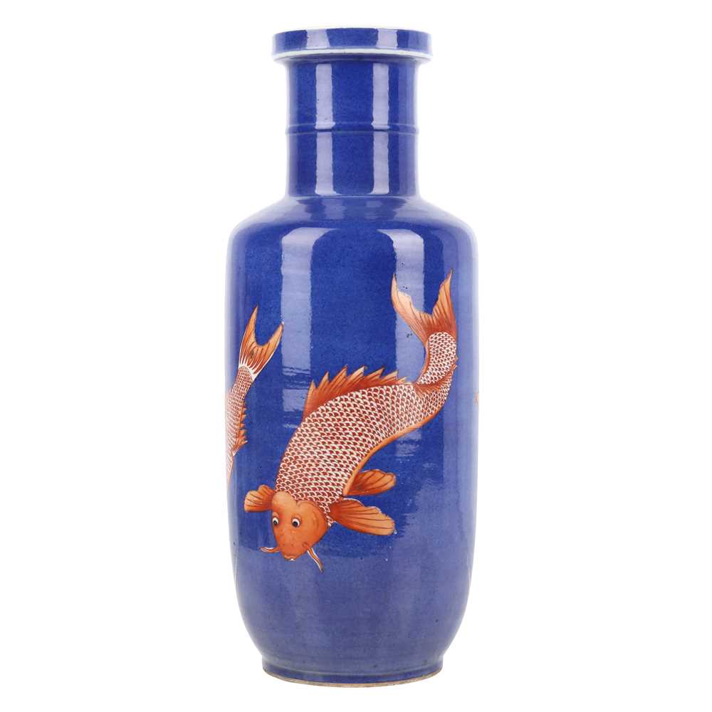 Lot 66 - A Chinese powder-blue iron-red 'carp' rouleau vase, Qing dynasty, Daoguang period