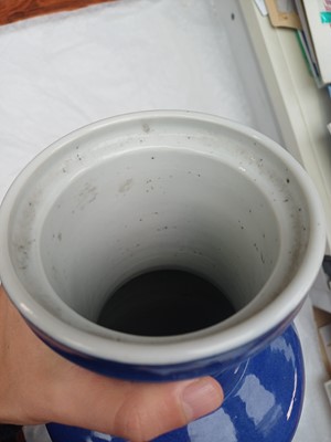 Lot 66 - A Chinese powder-blue iron-red 'carp' rouleau vase, Qing dynasty, Daoguang period