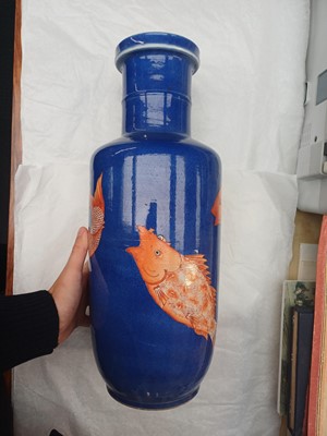 Lot 66 - A Chinese powder-blue iron-red 'carp' rouleau vase, Qing dynasty, Daoguang period
