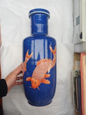 Lot 66 - A Chinese powder-blue iron-red 'carp' rouleau vase, Qing dynasty, Daoguang period