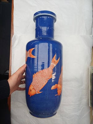 Lot 66 - A Chinese powder-blue iron-red 'carp' rouleau vase, Qing dynasty, Daoguang period