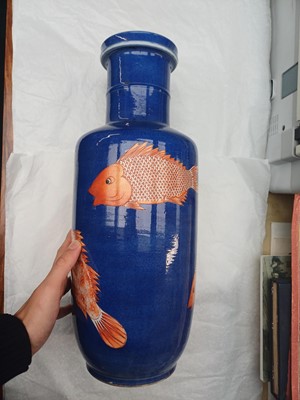 Lot 66 - A Chinese powder-blue iron-red 'carp' rouleau vase, Qing dynasty, Daoguang period