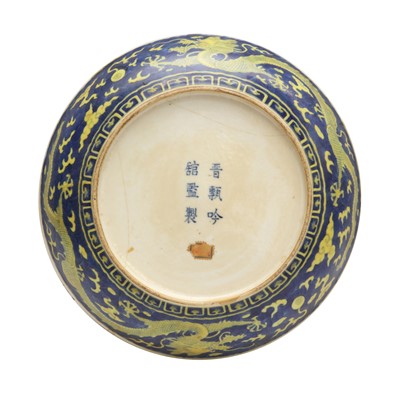 Lot 65 - A rare Chinese yellow-enamelled blue-ground 'dragon' dish, Qing dynasty, Daoguang period