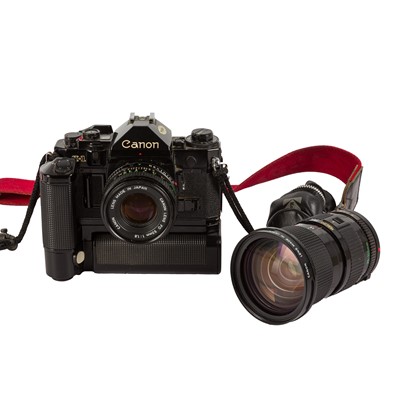 Lot 260 - A Canon AE1 SLR Camera Outfit