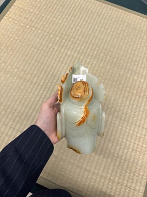 Lot 88 - A large Chinese celadon jade bust of Guanyin, Qing dynasty, 18th/19th century