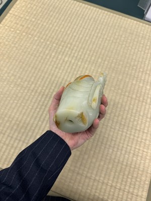 Lot 88 - A large Chinese celadon jade bust of Guanyin, Qing dynasty, 18th/19th century