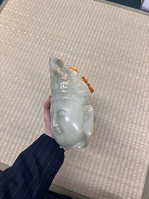 Lot 88 - A large Chinese celadon jade bust of Guanyin, Qing dynasty, 18th/19th century