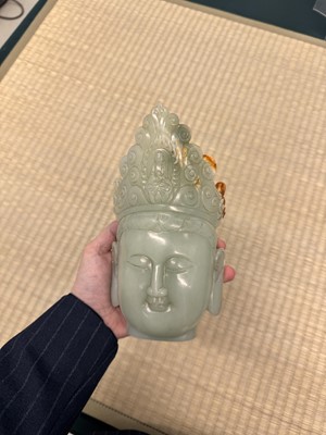 Lot 88 - A large Chinese celadon jade bust of Guanyin, Qing dynasty, 18th/19th century