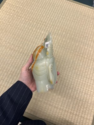 Lot 88 - A large Chinese celadon jade bust of Guanyin, Qing dynasty, 18th/19th century