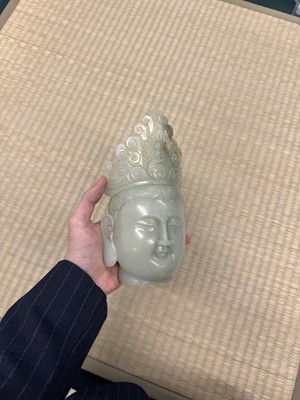 Lot 88 - A large Chinese celadon jade bust of Guanyin, Qing dynasty, 18th/19th century