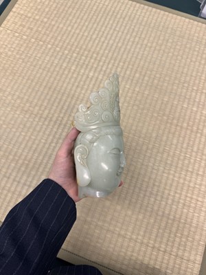 Lot 88 - A large Chinese celadon jade bust of Guanyin, Qing dynasty, 18th/19th century