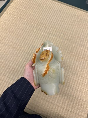 Lot 88 - A large Chinese celadon jade bust of Guanyin, Qing dynasty, 18th/19th century