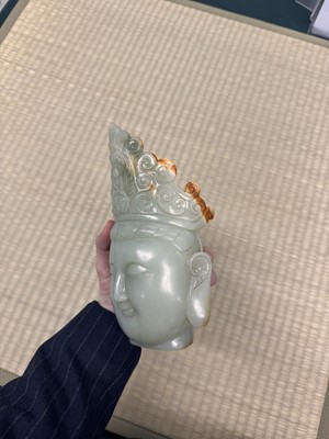 Lot 88 - A large Chinese celadon jade bust of Guanyin, Qing dynasty, 18th/19th century
