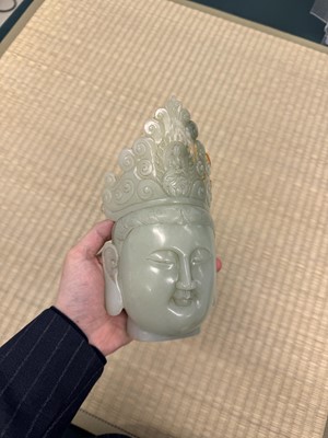 Lot 88 - A large Chinese celadon jade bust of Guanyin, Qing dynasty, 18th/19th century