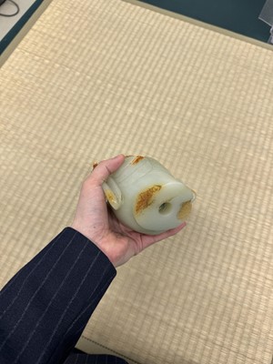 Lot 88 - A large Chinese celadon jade bust of Guanyin, Qing dynasty, 18th/19th century