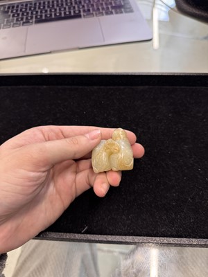 Lot 79 - A Chinese celadon jade 'horses' carving, probably Liao / Jin dynasty