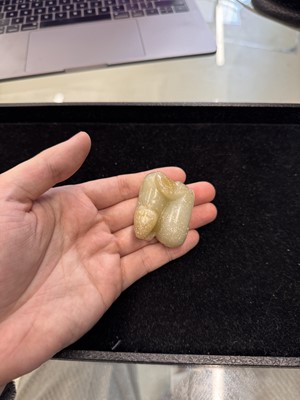 Lot 79 - A Chinese celadon jade 'horses' carving, probably Liao / Jin dynasty