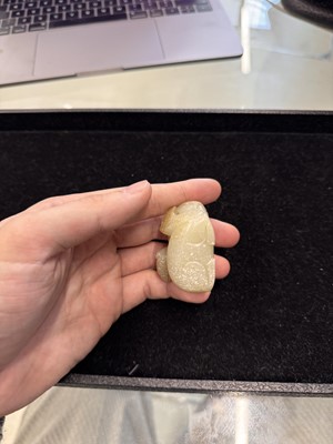 Lot 79 - A Chinese celadon jade 'horses' carving, probably Liao / Jin dynasty