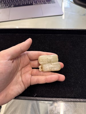 Lot 79 - A Chinese celadon jade 'horses' carving, probably Liao / Jin dynasty