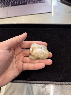 Lot 79 - A Chinese celadon jade 'horses' carving, probably Liao / Jin dynasty