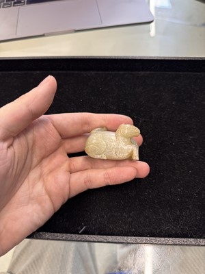 Lot 79 - A Chinese celadon jade 'horses' carving, probably Liao / Jin dynasty