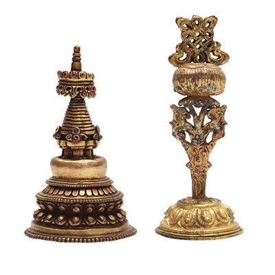 Lot 229 - A Tibetan gilt-bronze stupa and a gilt-copper altar ornament, 18th century