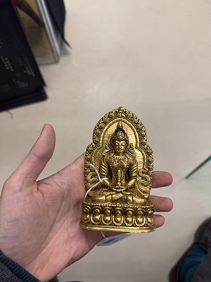 Lot 226 - A Sino-Tibetan gilt-bronze votive figure of Buddha Amitayus, Qing dynasty, 18th century