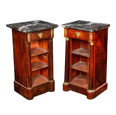 Lot 7 - A pair of French Empire Style marble topped walnut bedside cabinets, late 19th / early 20th century