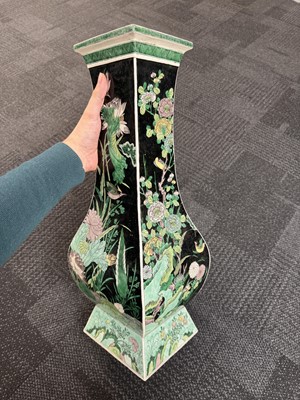 Lot 10 - A Chinese famille-noire 'birds and flowers' vase, Qing dynasty, Kangxi period