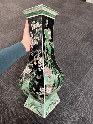 Lot 10 - A Chinese famille-noire 'birds and flowers' vase, Qing dynasty, Kangxi period