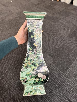 Lot 10 - A Chinese famille-noire 'birds and flowers' vase, Qing dynasty, Kangxi period