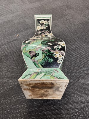 Lot 10 - A Chinese famille-noire 'birds and flowers' vase, Qing dynasty, Kangxi period