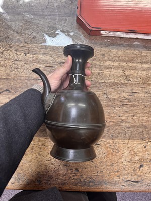 Lot 34 - A fine Japanese bronze ewer, Edo period