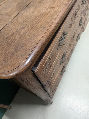 Lot 27 - A French Provincial oak chest of drawers, early 19th century
