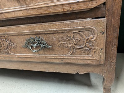 Lot 27 - A French Provincial oak chest of drawers, early 19th century
