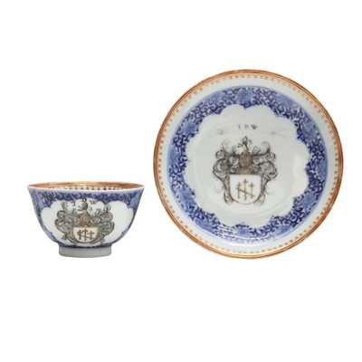 Lot 218 - A Chinese armorial cup and saucer, Qing dynasty, Qianlong period