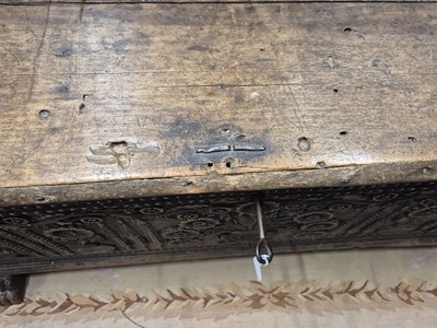 Lot 28 - A carved oak coffer, 17th / 18th century