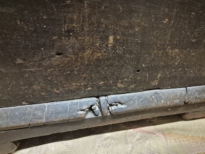 Lot 28 - A carved oak coffer, 17th / 18th century