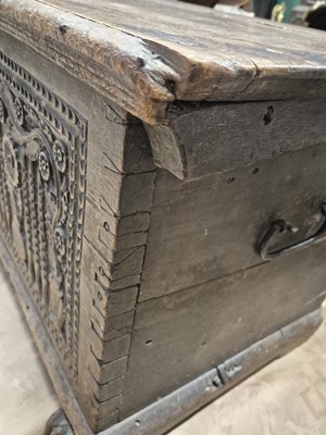 Lot 28 - A carved oak coffer, 17th / 18th century