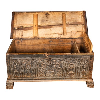 Lot 28 - A carved oak coffer, 17th / 18th century