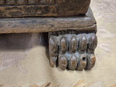 Lot 28 - A carved oak coffer, 17th / 18th century