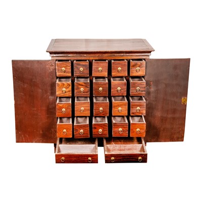Lot 51 - An Indian rosewood spice cabinet