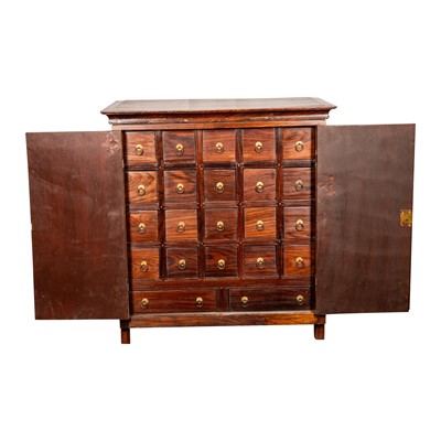 Lot 51 - An Indian rosewood spice cabinet