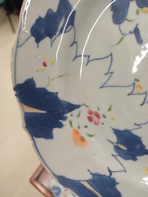 Lot 75 - A pair of Chinese famille-rose 'tobacco leaf' dishes, Qing dynasty, 18th century