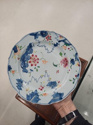 Lot 75 - A pair of Chinese famille-rose 'tobacco leaf' dishes, Qing dynasty, 18th century