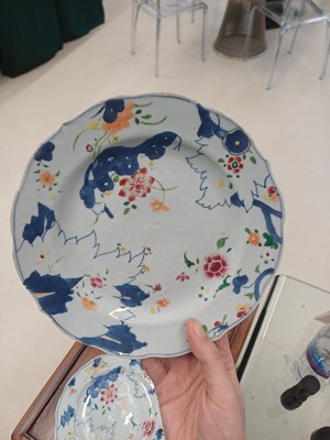 Lot 75 - A pair of Chinese famille-rose 'tobacco leaf' dishes, Qing dynasty, 18th century