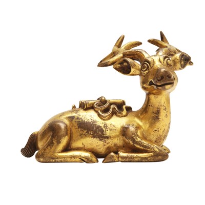 Lot 536 - A Chinese gilt-bronze figure of a deer, 19th/20th century