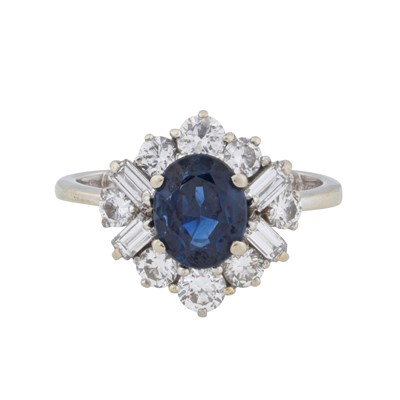 Lot 37 - Boucheron Ι A sapphire and diamond cluster ring, circa 1982