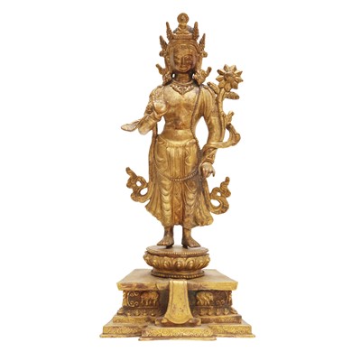 Lot 535 - A Nepalese gilt-bronze figure of Padmapani Lokeshvara, 19th / 20th Century