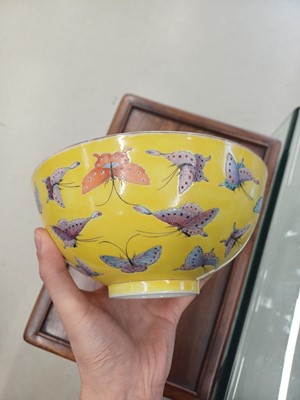 Lot 96 - A Chinese famille-rose yellow-ground 'butterfly' bowl, Qing dynasty, Tongzhi mark and period